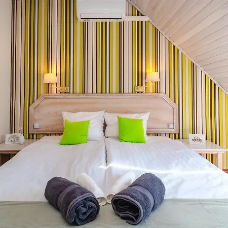 Belysium Wine&relax Vendeghaz 4* גיינסדיאס